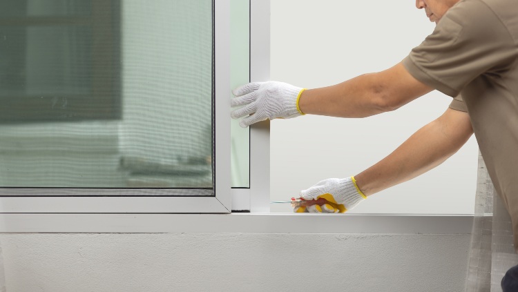Home window mid-replacement with visible tools and materials in Jacksonville, FL
